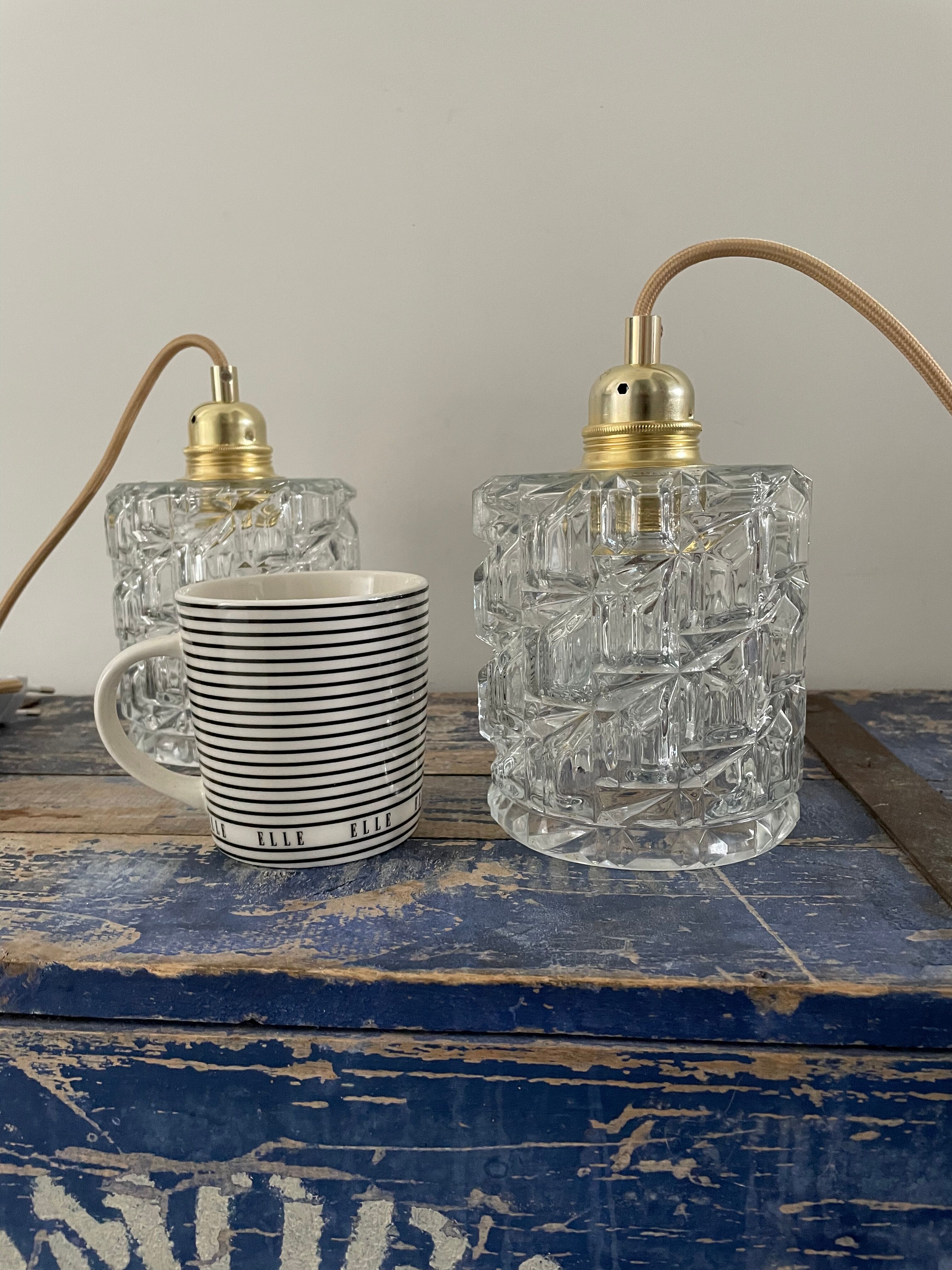 Set of two vintage electric chiseled glass walking lamps