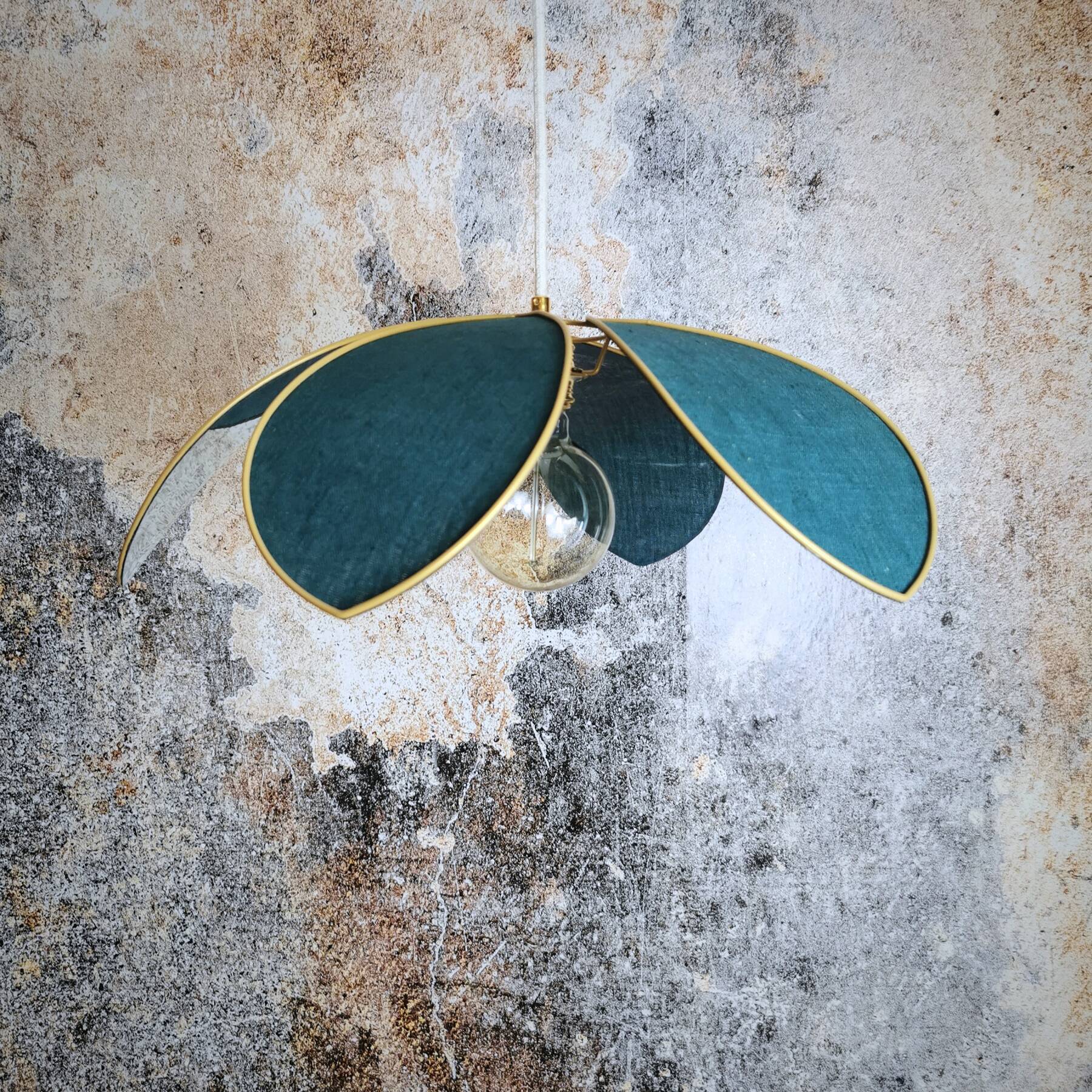 Flower suspension with metal structure and peacock blue linen petals