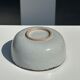 Small white glazed ceramic bowl black edges