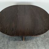 Round teak table with extension