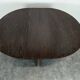 Round teak table with extension
