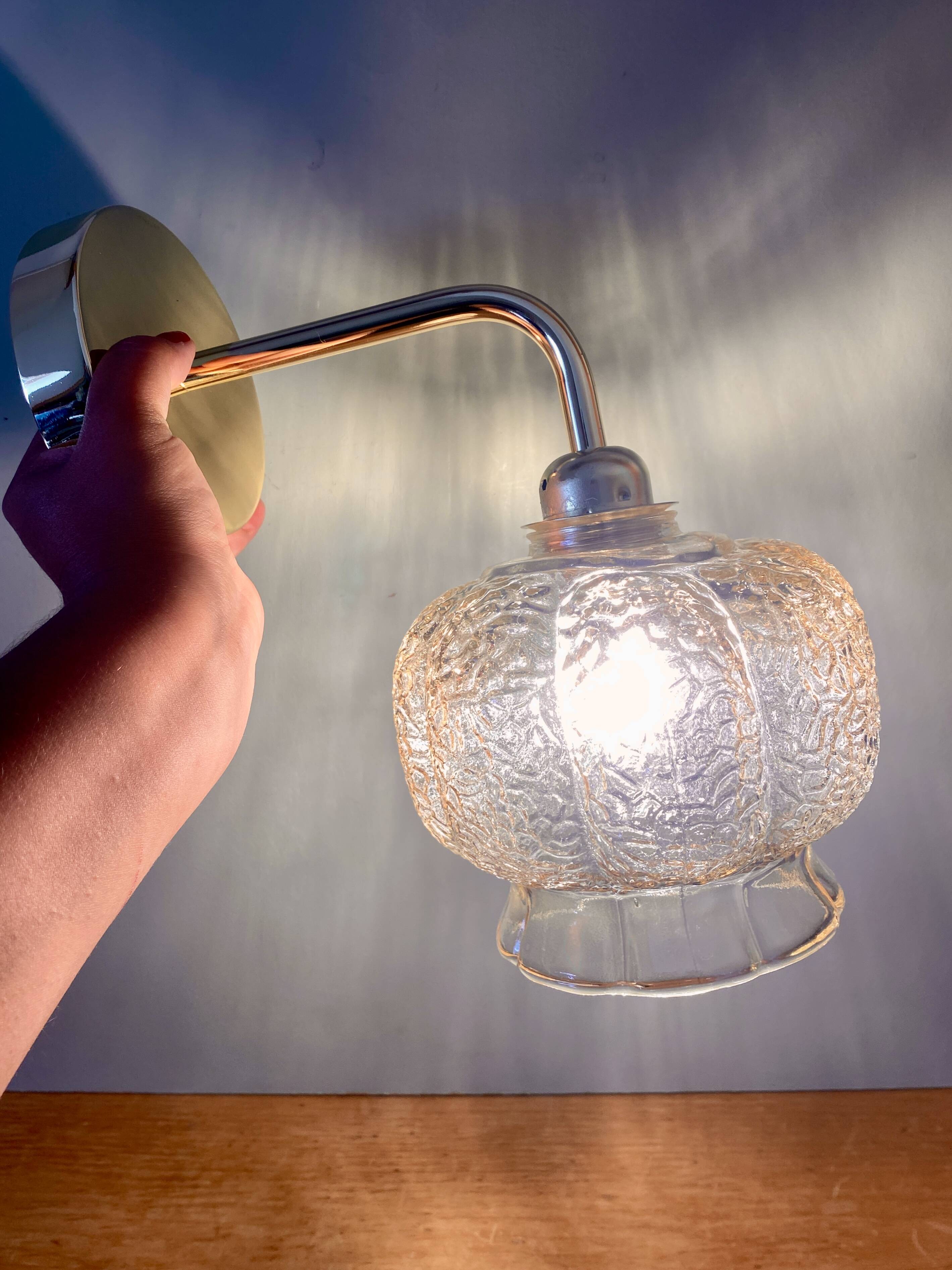 Vintage golden globe angled wall light in amber glass