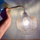 Vintage golden globe angled wall light in amber glass