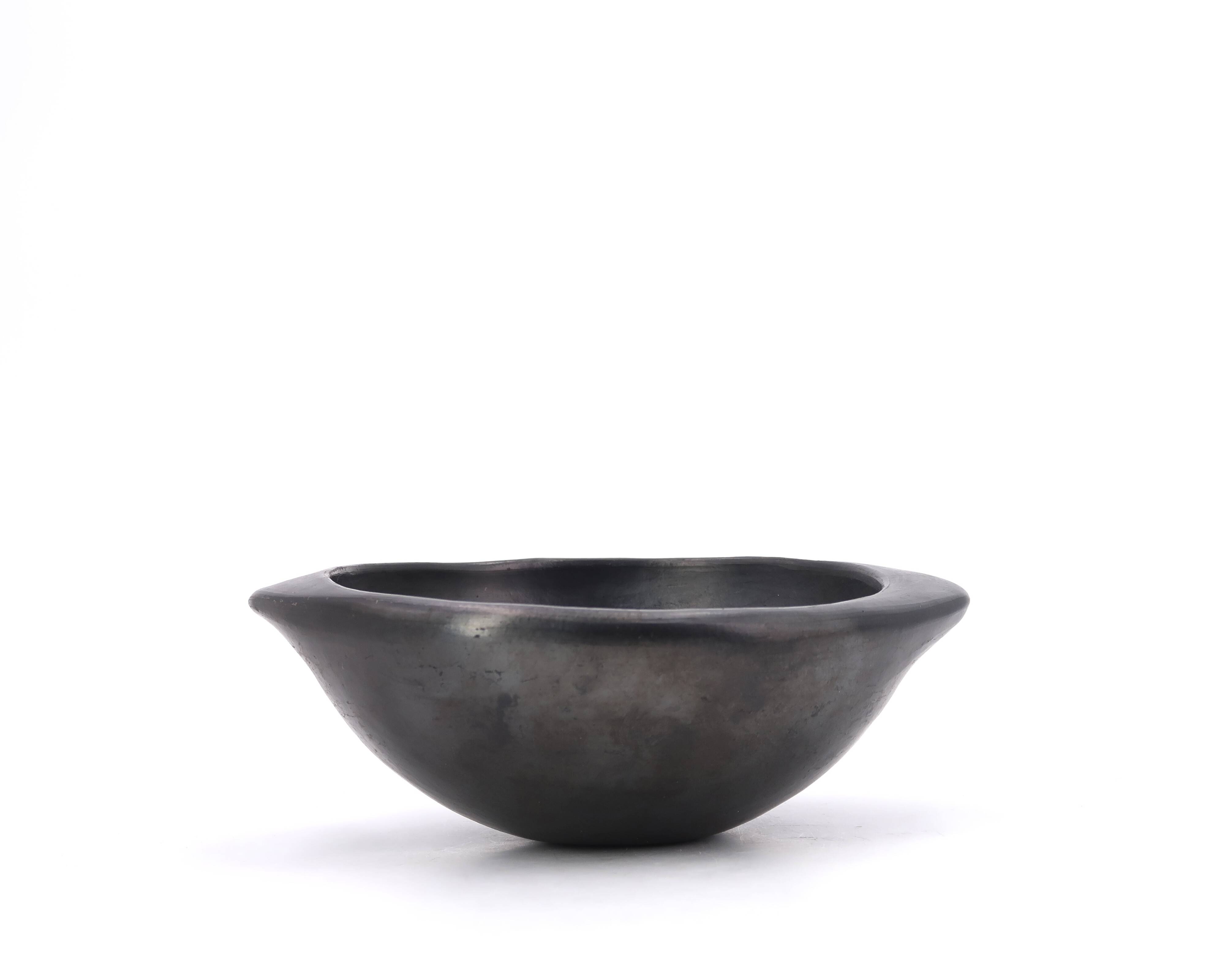 Colombian Chamba black ceramic pocket emptier, 70s