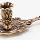 Old brass hand candle holder