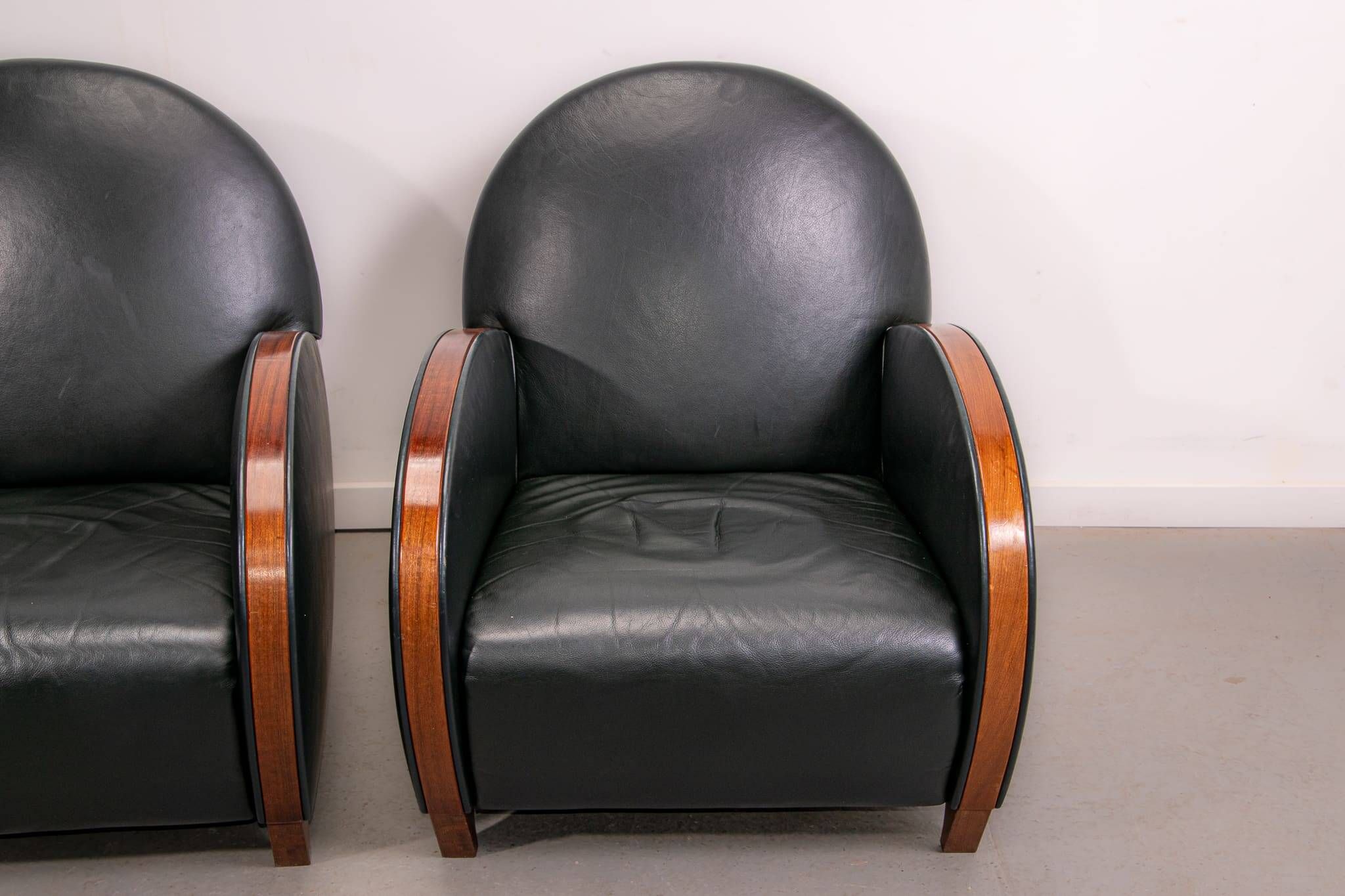 Pair of mid-century leather armchairs, circa 1970, made in Belgium.
