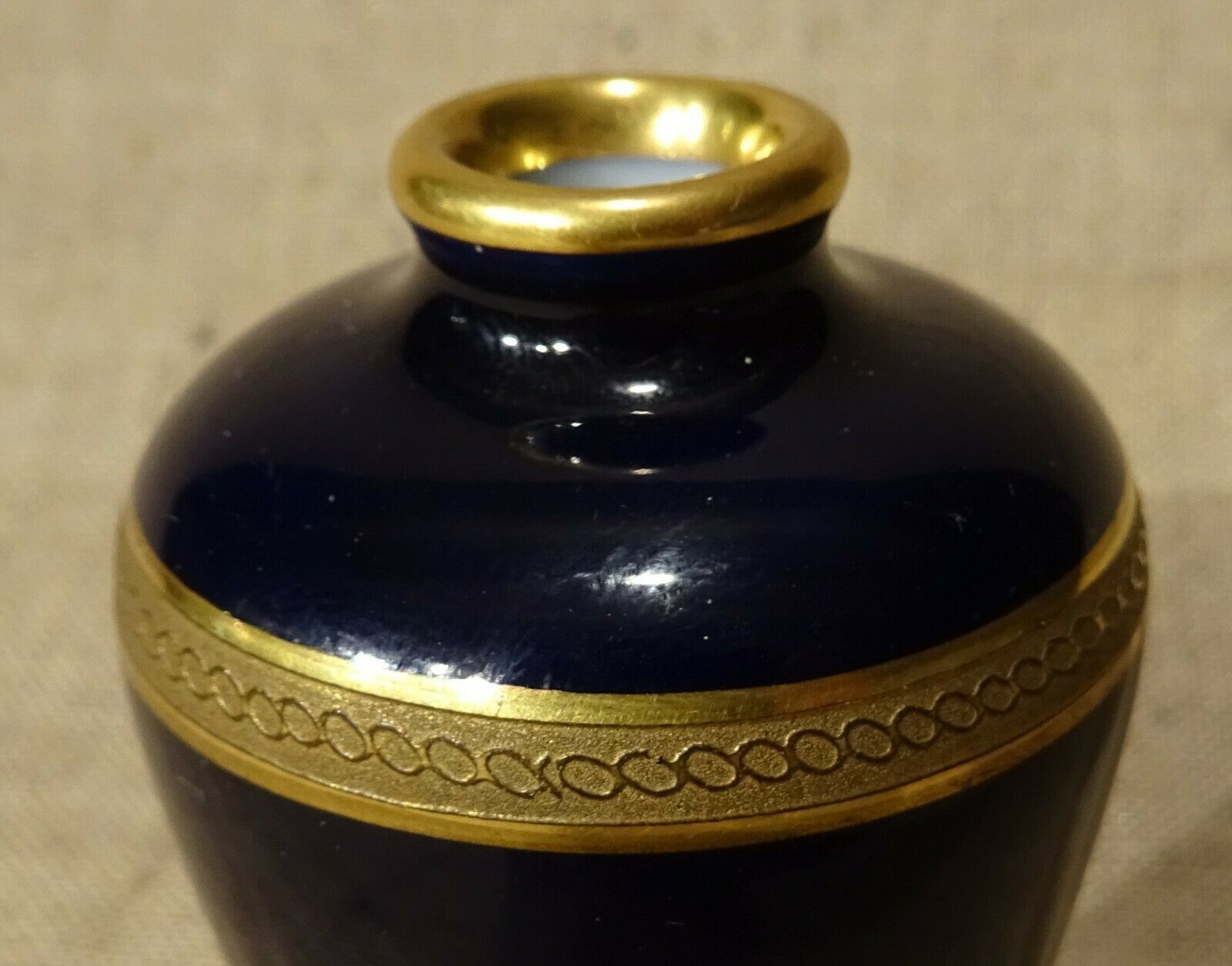 Porcelain miniature vase of blue and gold limoges