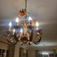 Set of painted metal chandeliers with flower decor