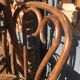 Six patinated bistro chairs