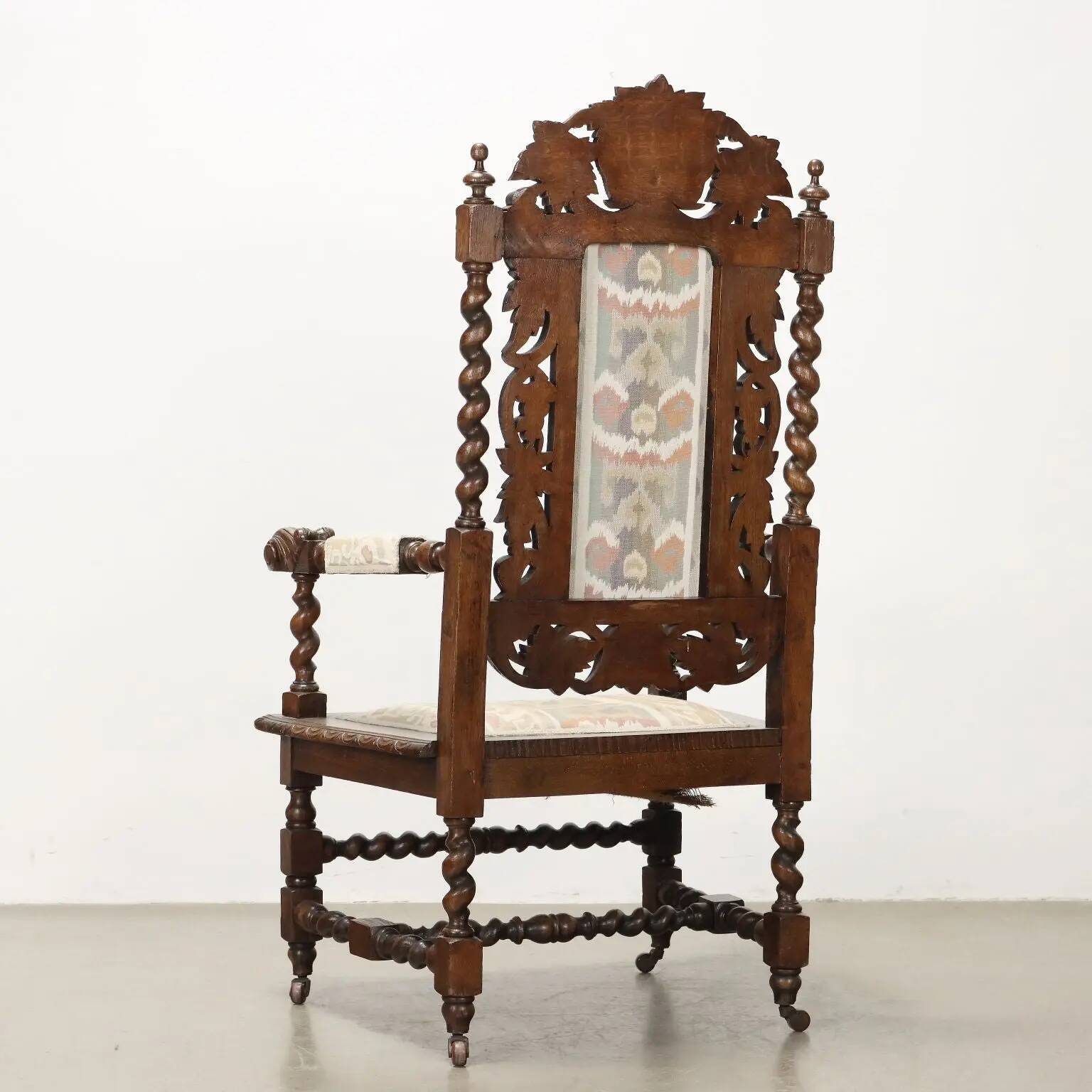 Antique Neo-Renaissance armchair in oak and fabric, 19th-20th century.