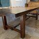 Solid vintage oak dining table in refectory style. Seats 8–10 people.