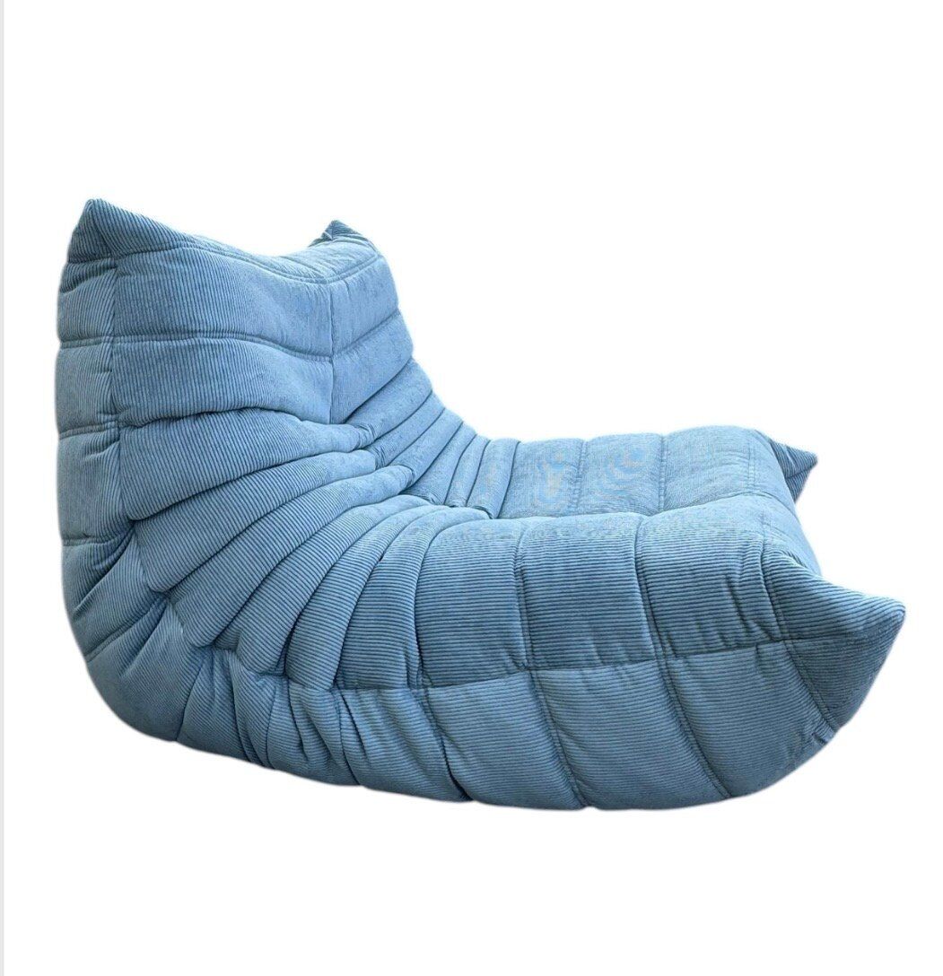 Togo lounge chair in light blue corduroy by Michel Ducaroy for Ligne Roset