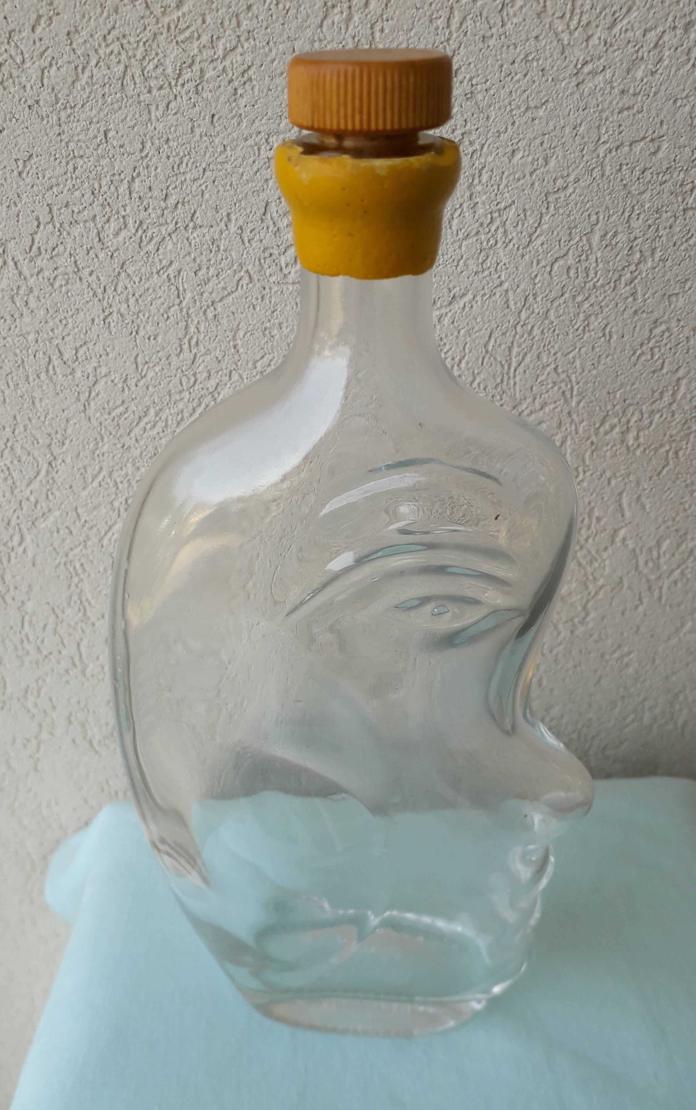 Bouteille anthropomorphe en verre