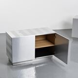 Pair of low buffets in brushed metal, French work, 1970s.