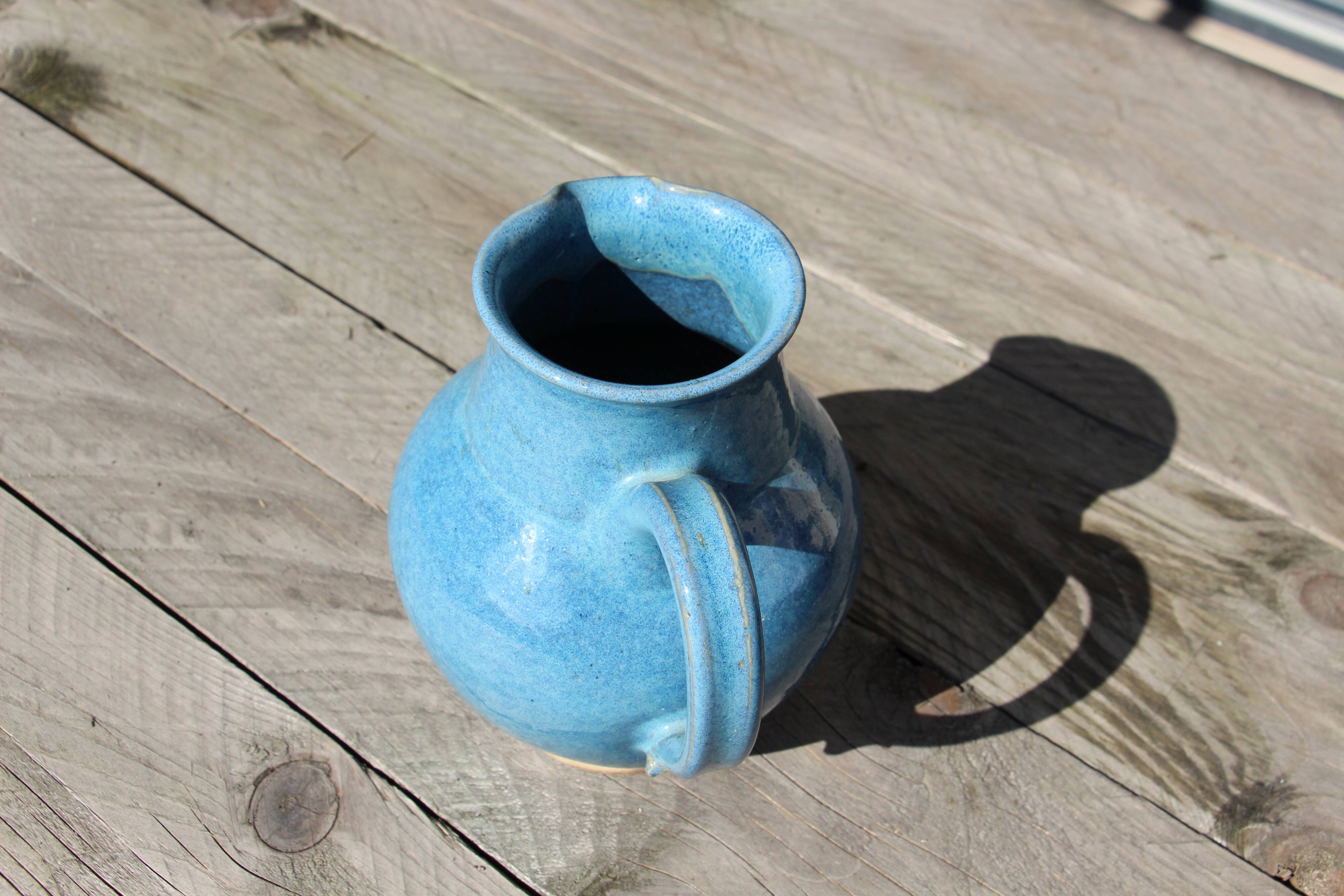 Blue ceramic pitcher