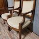 Pair of Empire period armchairs, in mahogany and gilded bronze.