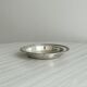 Round patinated silver-plated metal dish