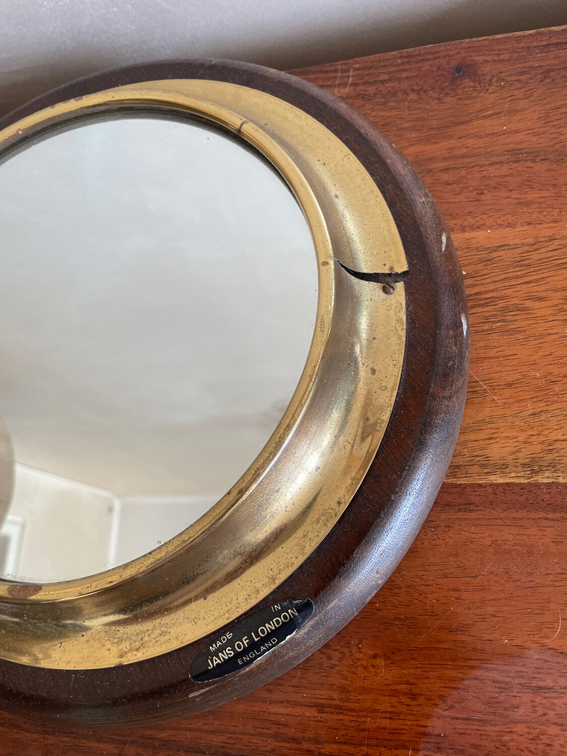 Wood and brass mirror