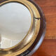 Wood and brass mirror