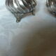Pair of silver pepper shaker punch minerve