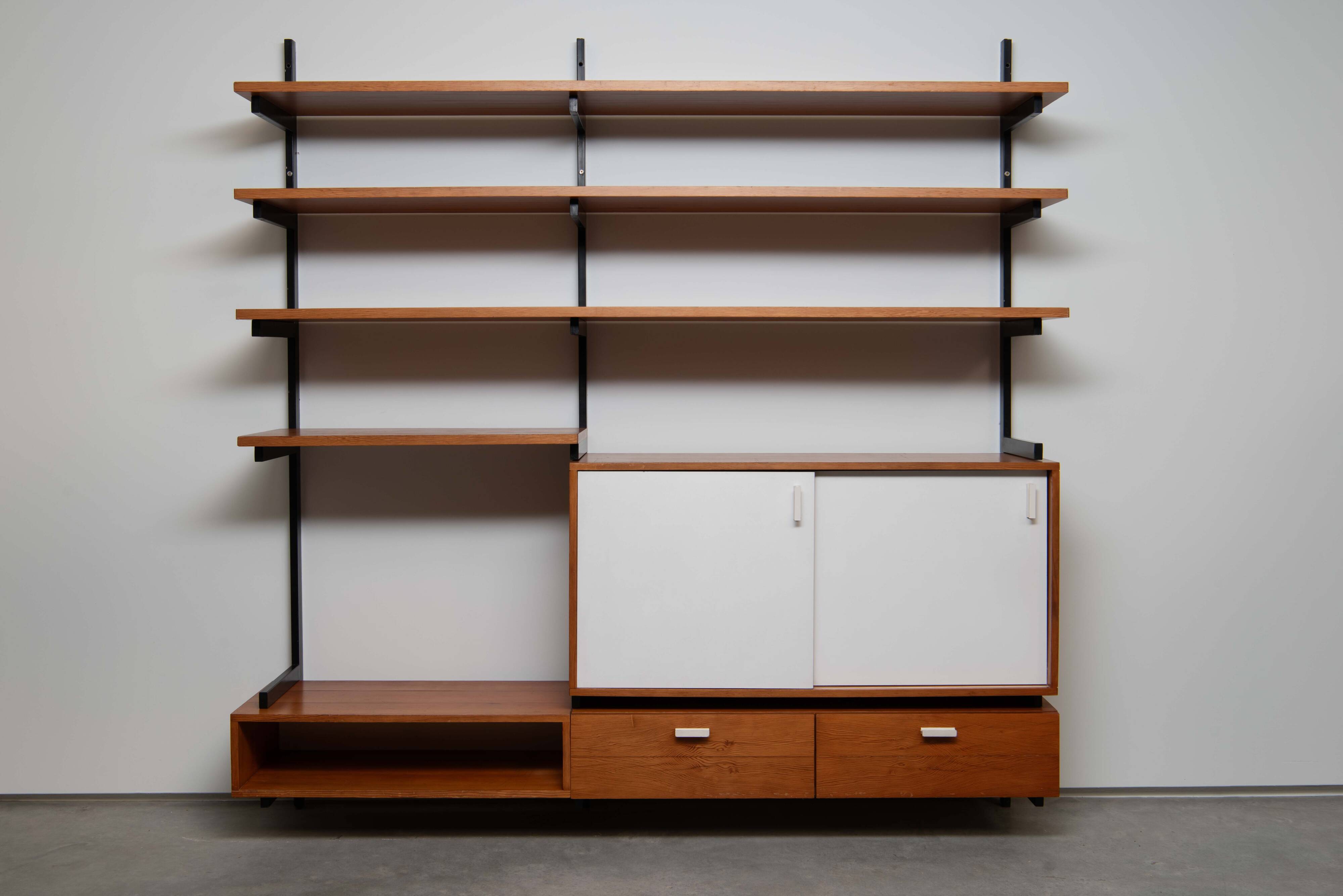 Teak wall shelf designed by Jul de Roover