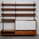 Teak wall shelf designed by Jul de Roover