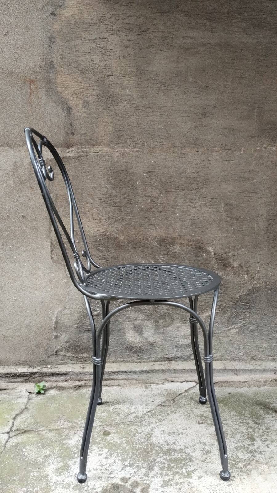 Dark gray wrought iron chair