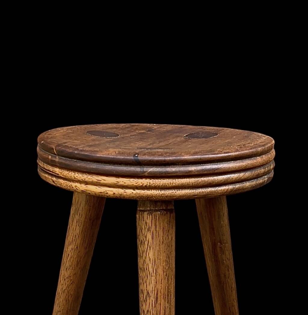 Old small wooden tripod stool