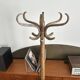 Baumann coat rack, swivelling parrot design from the 60s/70s in wood.