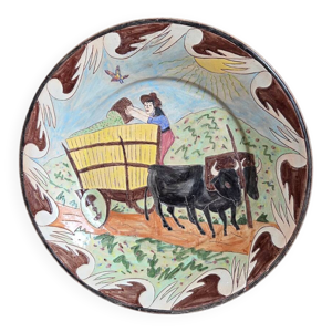 plat en terre cuite signé