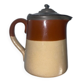 Small beige brown English earthenware milk jug