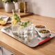 Grand plateau design en inox signé morinox, typique du style des année