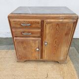 Vintage wooden buffet with a marble top.