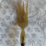 Horn and metal salad servers from the 1920s