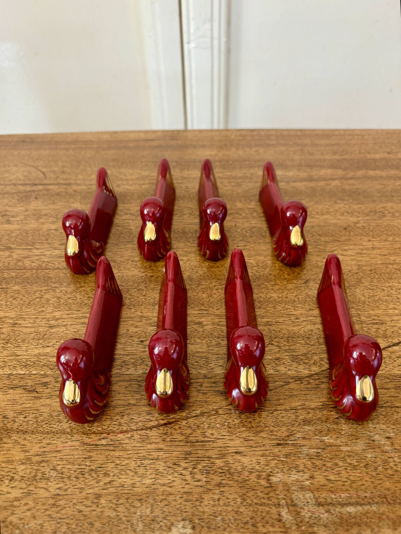 Set of 8 vintage slip knife holders in the shape of red ducks and