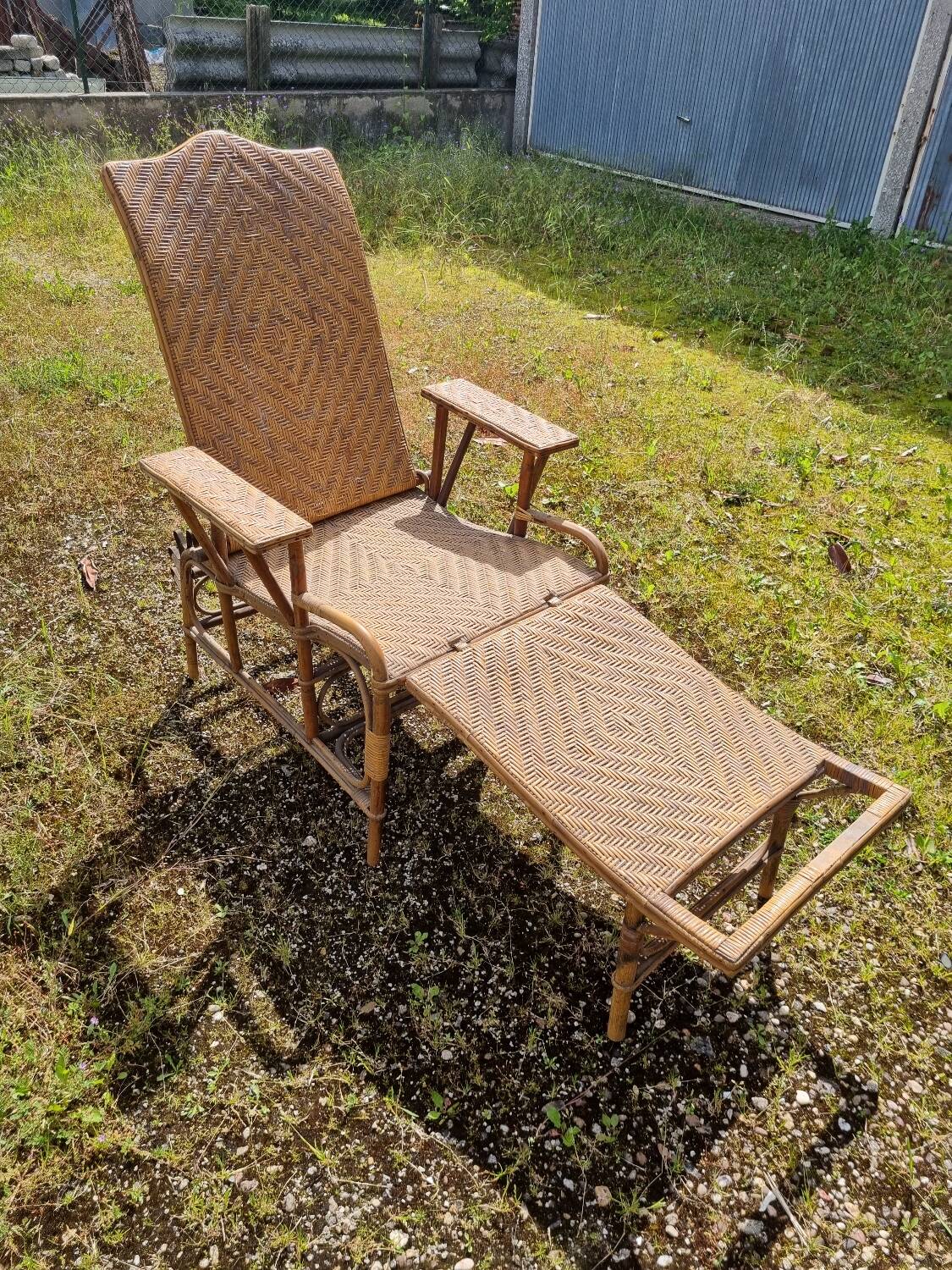 Old vintage rattan lounge chair