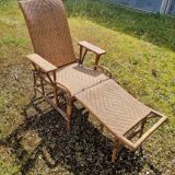 Old vintage rattan lounge chair