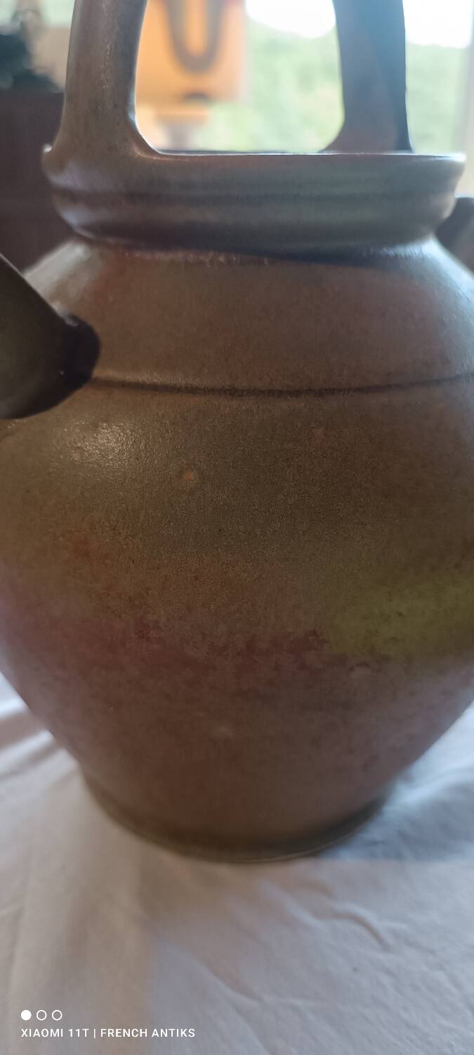 Iridescent carafe and 3 stoneware mazagrans from Digouin. Handmade work.