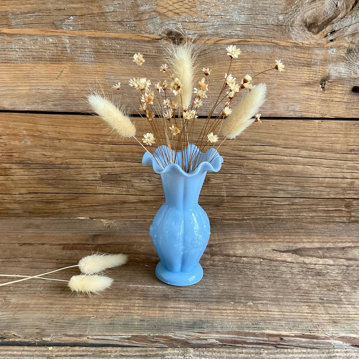 Small blue milk glass vase