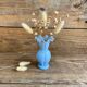Small blue milk glass vase