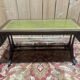English Regency coffee table, mahogany & green stamped leather with gold.