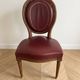 Set of 6 Louis XVI style medallion chairs and armchairs in burgundy leather.