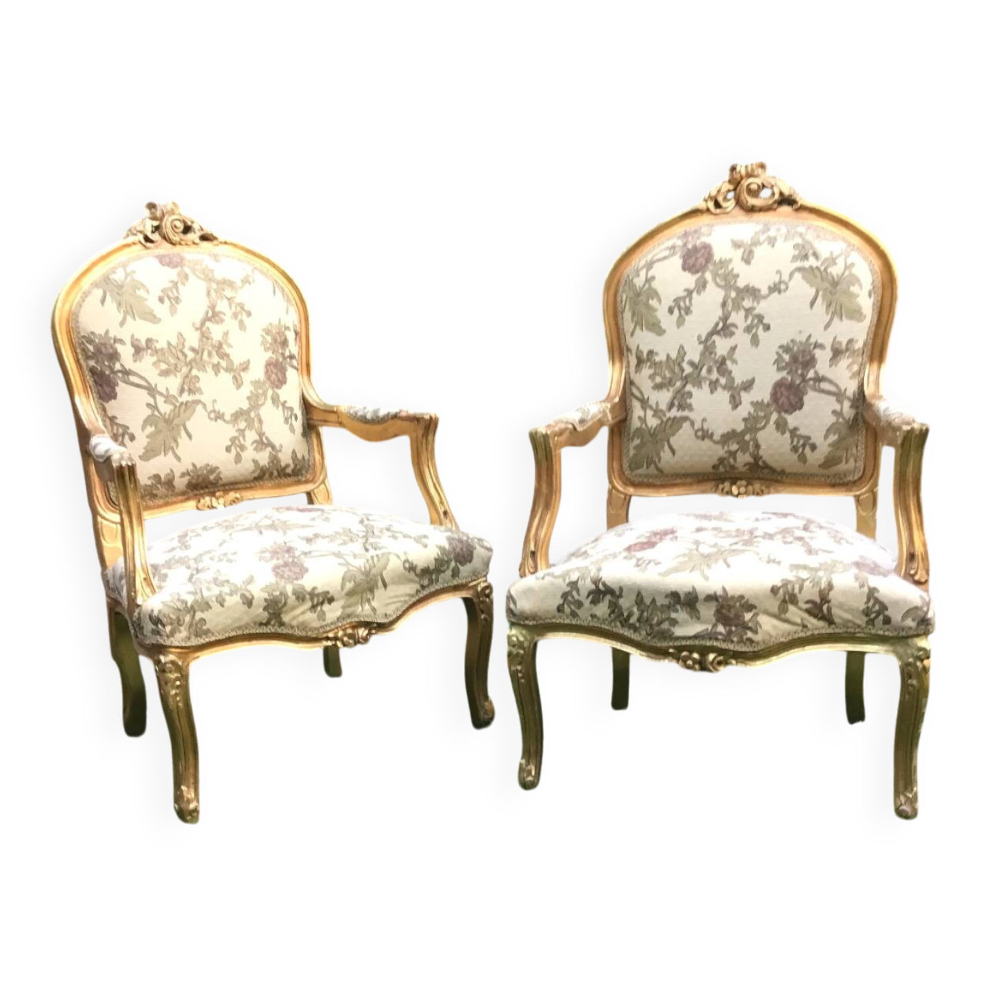 Pair of straight-backed armchairs, known as "queen's armchairs," in carved and gilded wood