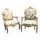 Pair of straight-backed armchairs, known as "queen's armchairs," in carved and gilded wood