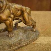 Sculpture of a lion in patinated terracotta by A. Fagotto, 1930s.