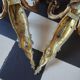 Pair of gilt bronze caryatid sconces