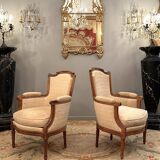 Pair of Louis XVI style walnut shepherdesses circa 1900