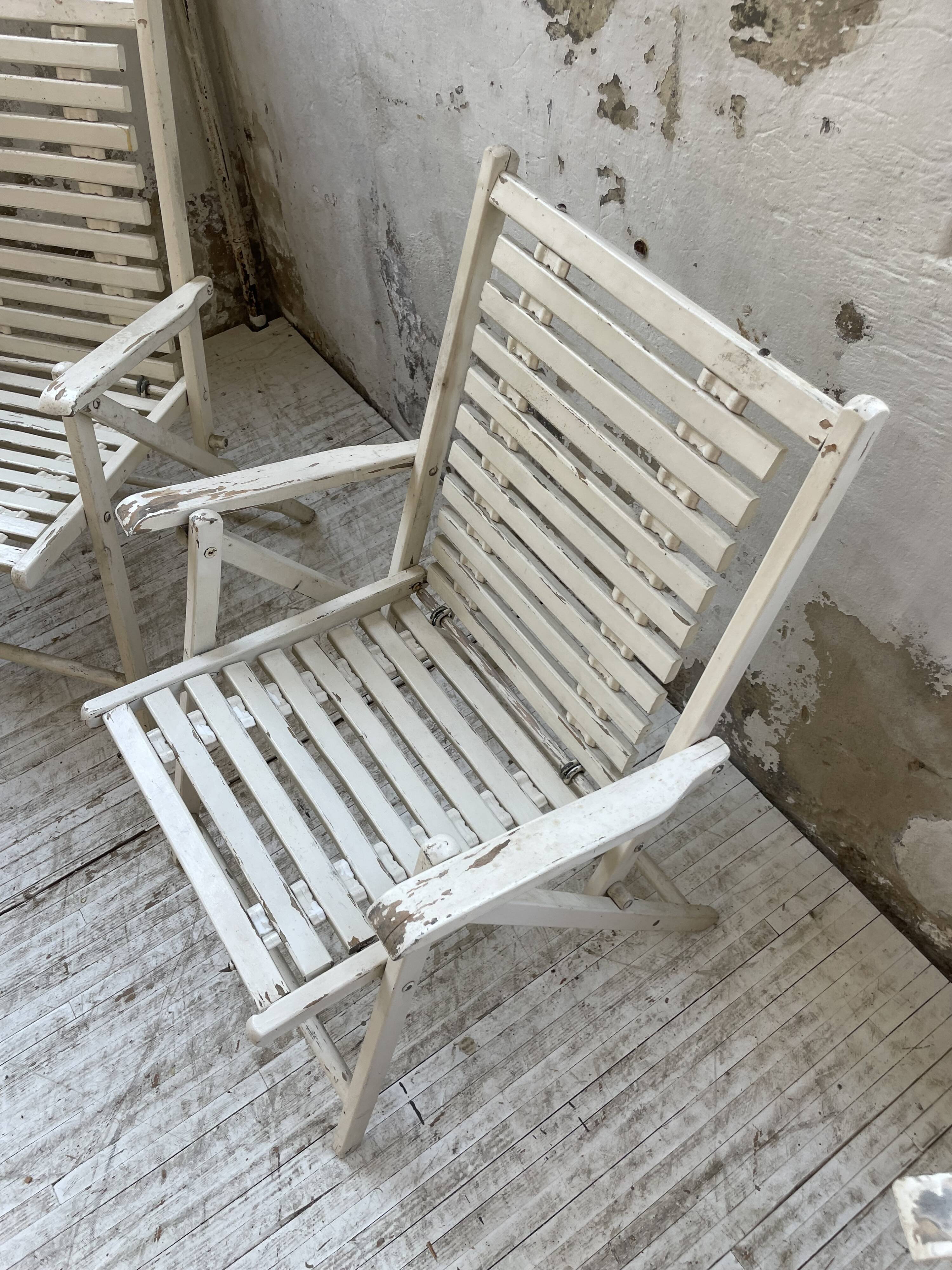 4 white wooden garden chairs