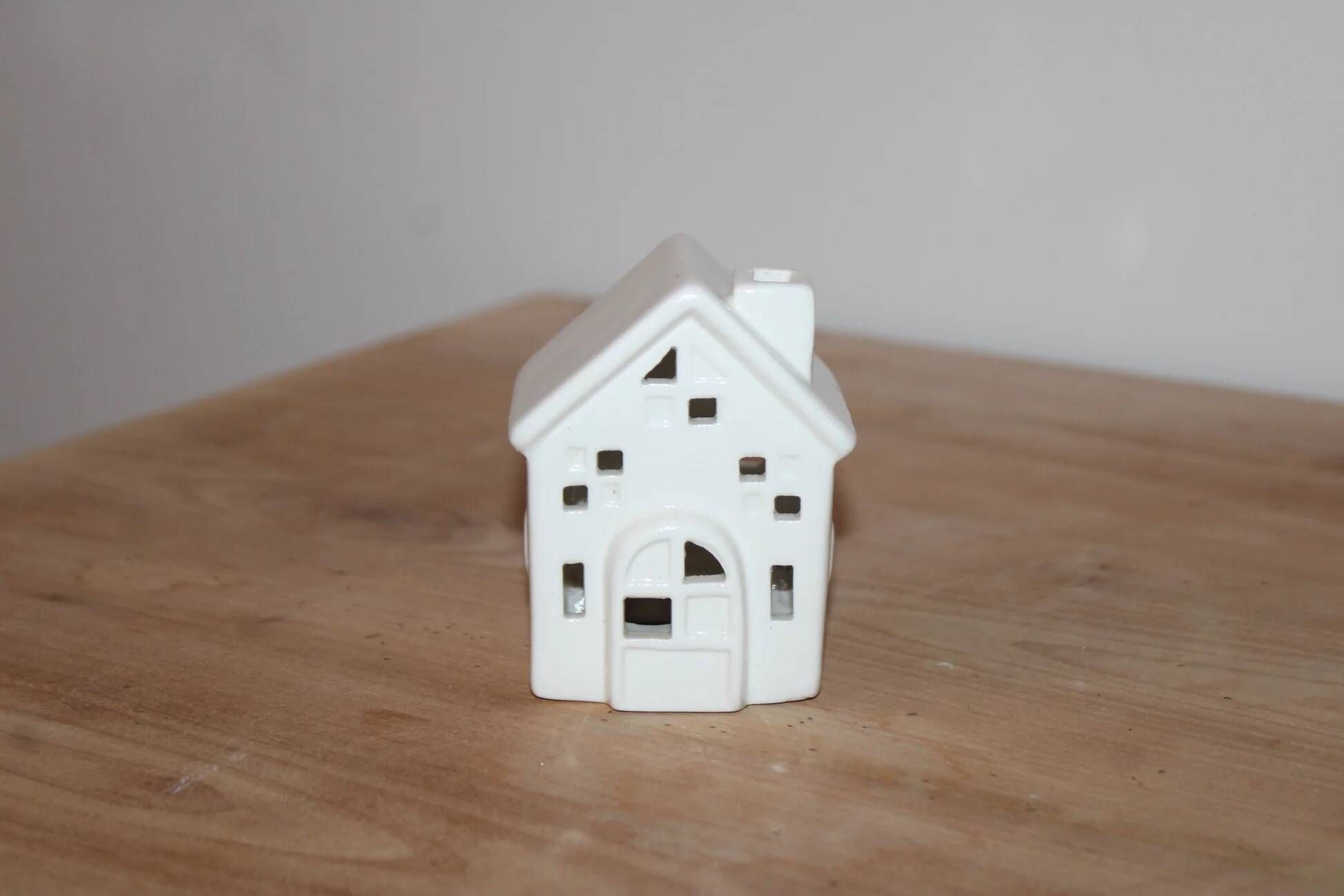 White perforated ceramic house lantern – Light decoration