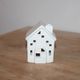 White perforated ceramic house lantern – Light decoration